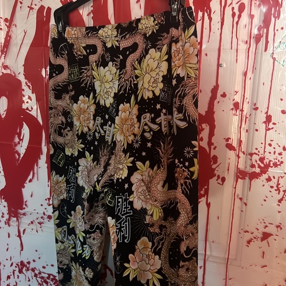 these pants are flowing and long but they don’t drag - Picture 2 of 3